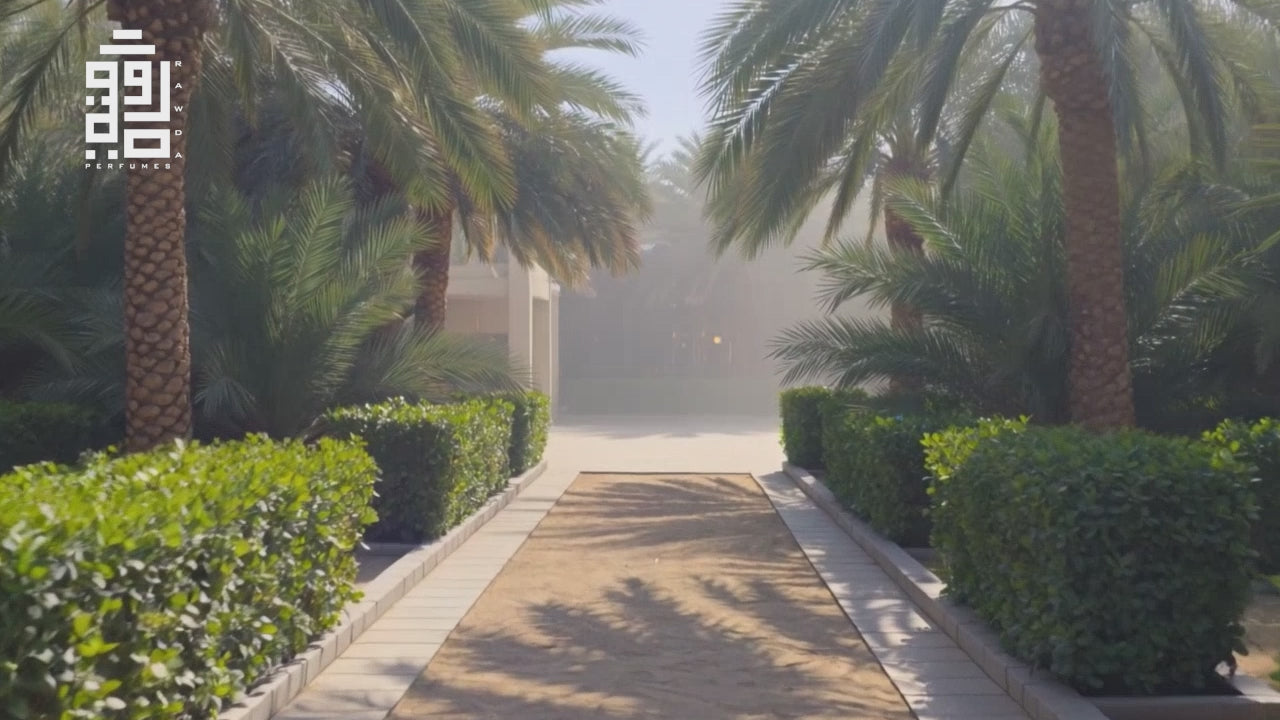 Load video: A model walking in a garden and exploring Nakhla Perfume Spray